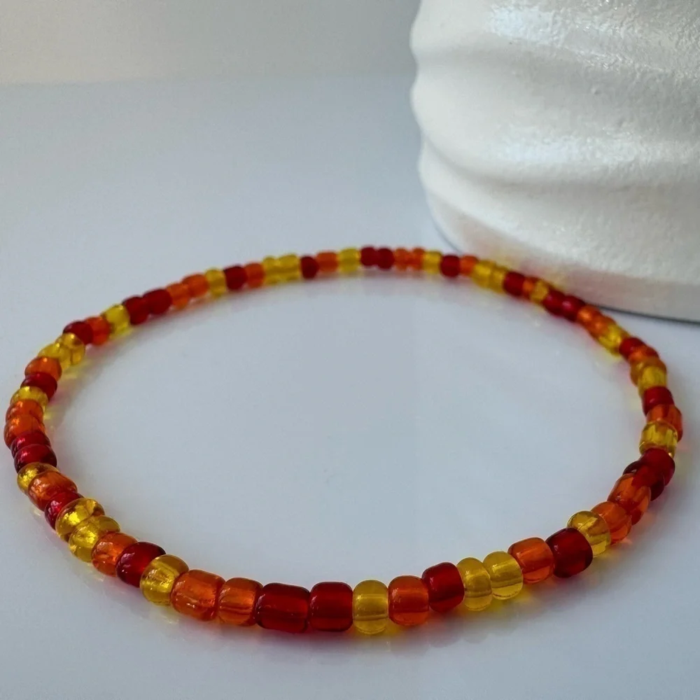 Stretch Beaded Anklet in Red Yellow & Orange   Size 9”